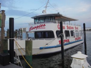 Glass bottom boat for dolphin cruises in Destin Harbor are part of the experience of Destin Florida Beaches