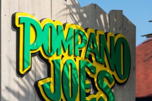 pompano joe's sign a very popular restaurant in destin
